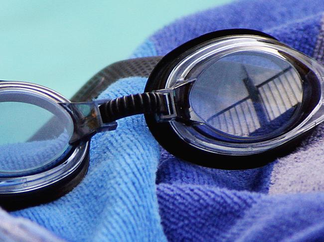 Swimming goggles on a towell.Photo Jocelyn Watts / Fraser Coast Chronicle