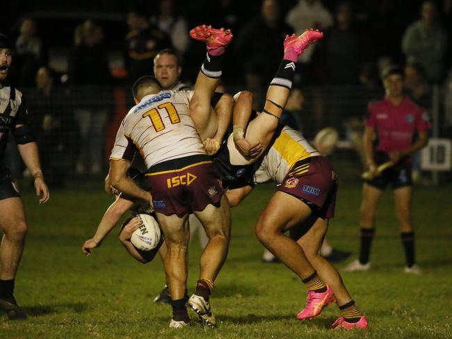 Thirlmere's Harrison Coskerie (No.11) was placed on report for this tackle. Picture: Warren Gannon Photography