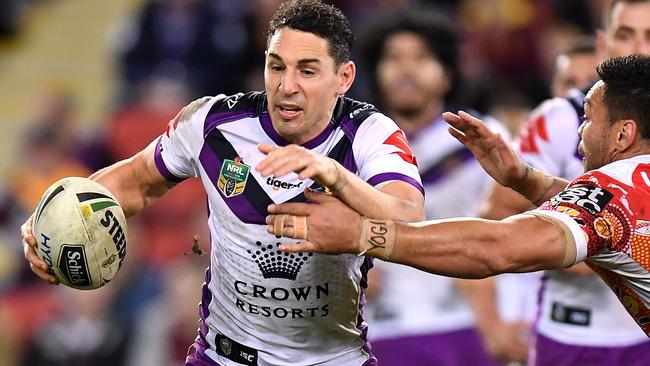 Billy Slater makes a charge against the Broncos.