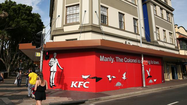 Signage to cover the construction of the new KFC on The Corso, Manly, has offended residents. Picture: Troy Snook