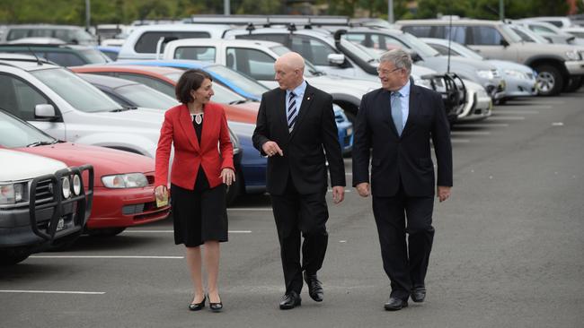 Then-NSW Transport Minister Gladys Berejiklian and former Campbelltown MP Bryan Doyle with former Campbelltown Mayor Paul Lake at the announcement of additional parking for Campbelltown Station during the 2015 election campaign. Picture: Robert Pozo