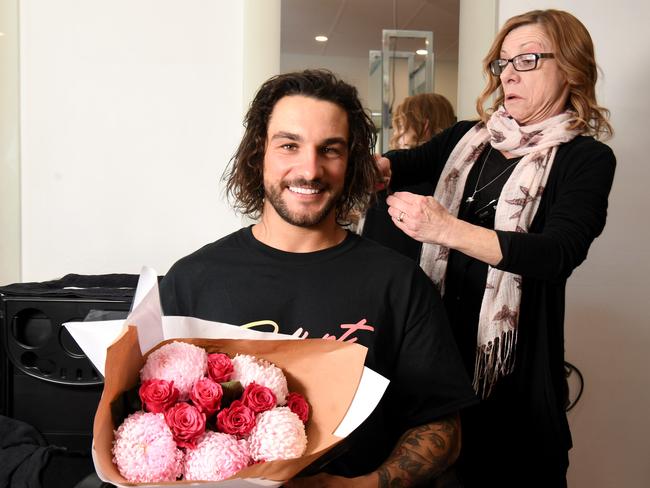 Bachelorette contestant Alex McKay home in Adelaide to surprise his mum Ilona for her birthday. He is pictured at his mum's workplace Illusion Hair Body Makeup at Surry Downs. Picture: Tricia Watkinson.