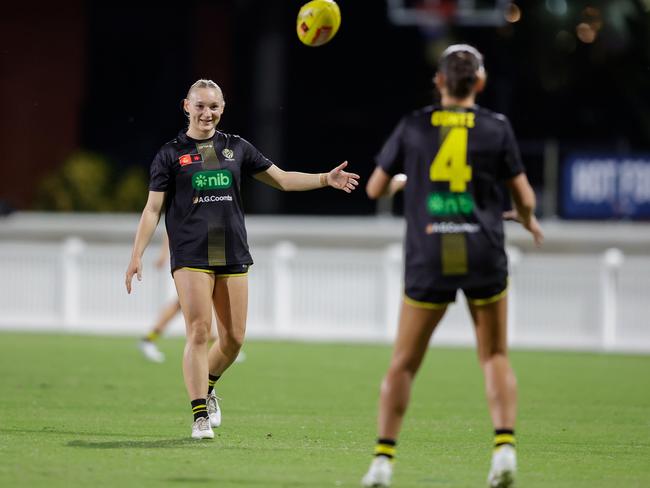 Mackenzie Ford warms up before a practice game against Brisbane. (Photo by Russell Freeman/AFL Photos via Getty Images)