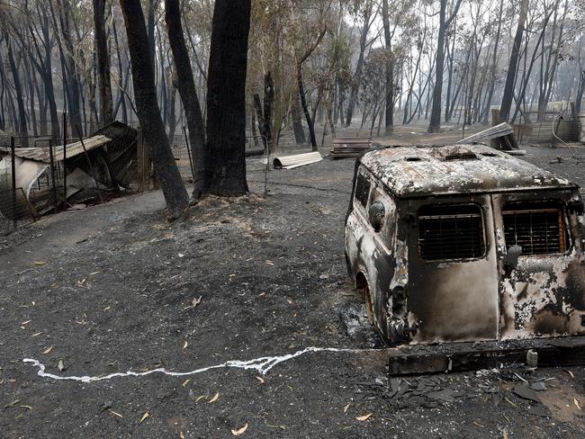 A burnt out vehicle in Dargan. Picture: Jeremy Piper