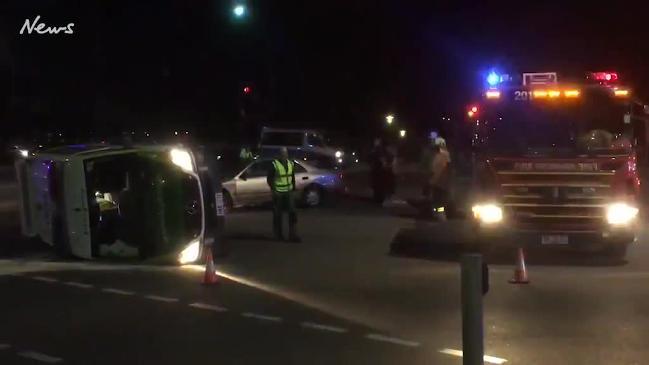 Ambulance rolls after being hit by car near RAH