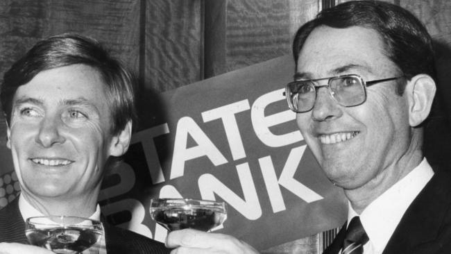 Labor Premier John Bannon opens the new State Bank of South Australia on July 2, 1984, sharing a champagne toast with the managing director Tim Marcus Clark.