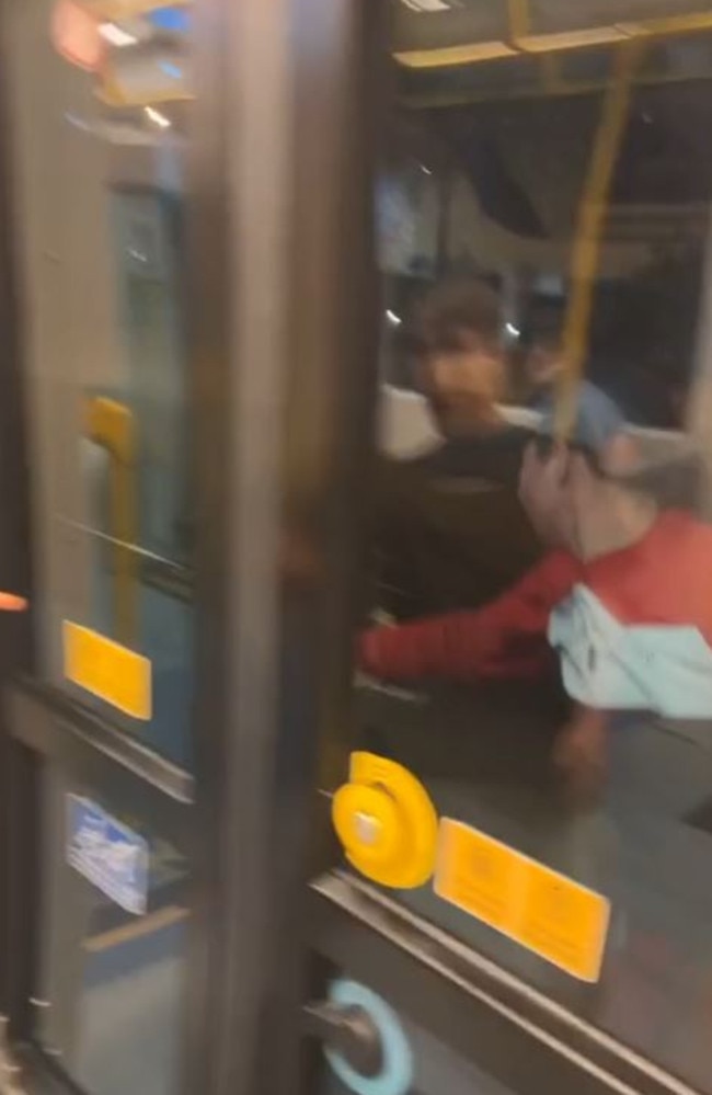 Screenshots from a video of a teen tram surfing on the Gold Coast. Picture: TikTok