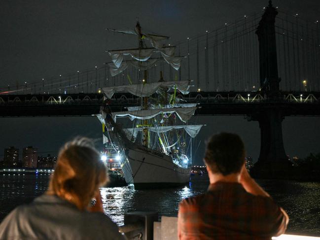 A Mexican Navy training ship is seen near the Manhattan Bridge after it slammed into the nearby Brooklyn Bridge in New York on May 17, 2025. Picture: AFP