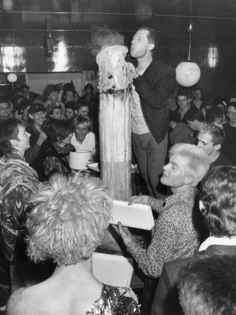 Phillip Searle "blows out" the ice-cream cigarette at the farewell dinner. Picture: Paul Lakatos