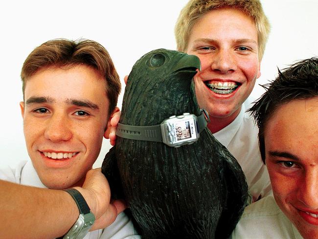 As just a nerd-burger pup. Humphries (centre) with Chris Brycki and Joel Palmer at North Sydney Boys High School in 2002 for an award after they, and others imported, marketed and distributed a TV remote watch under business skills program Young Achievement Australia. Picture: Phil Blatch