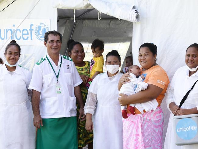 Poutasi District Hospital Nurse Manager Fa'aaogaina James Belford with staff and families vaccinating their children. Picture: Infinity Images Fiji.