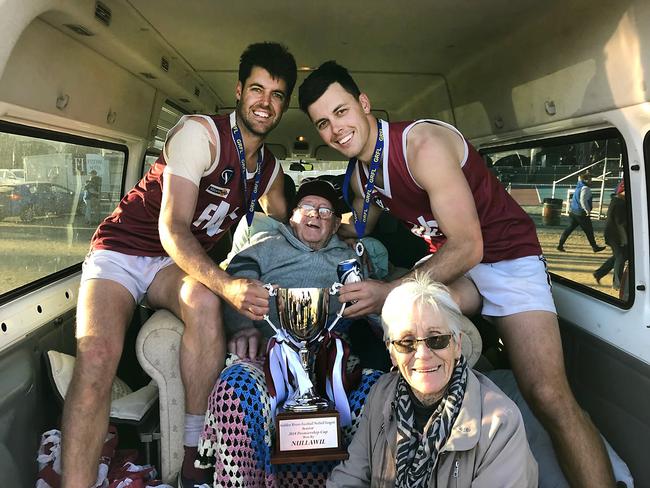 Proud supporter: Phil O’Bree with his grandsons Matt and Kal Heslop (left) after Nullawil won the Golden Rivers premiership (below).