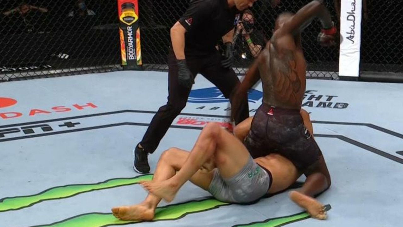 Israel Adesanya stops Paulo Costa in the second round.