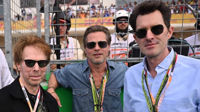 Producer Jerry Bruckheimer, Brad Pitt and director Joseph Kosinski are filming a movie at Silverstone this weekend. Picture: Patrick T. FALLON / AFP