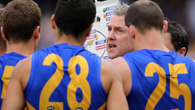 West Coast coach Adam Simpson speaks to his players.