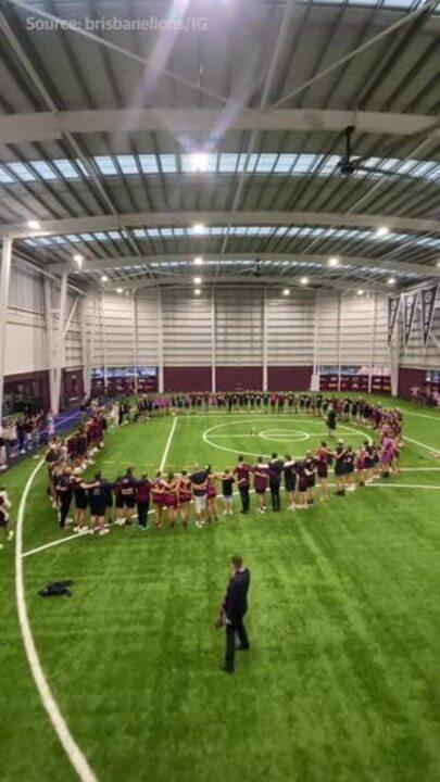 Both Brisbane Lions teams sing club song together