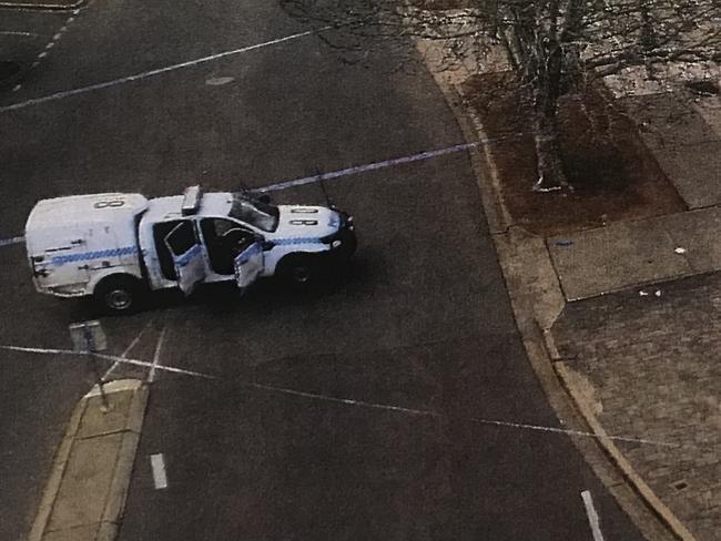 The police paddy wagon shot at by Warner after being confronted by police outside the Queanbeyan Showground.