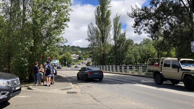 The sun was shining in Picton on Friday and people were walking and driving over Stonequarry Bridge, which was flooded only two days ago on March 2. Picture: Adelaide Lang