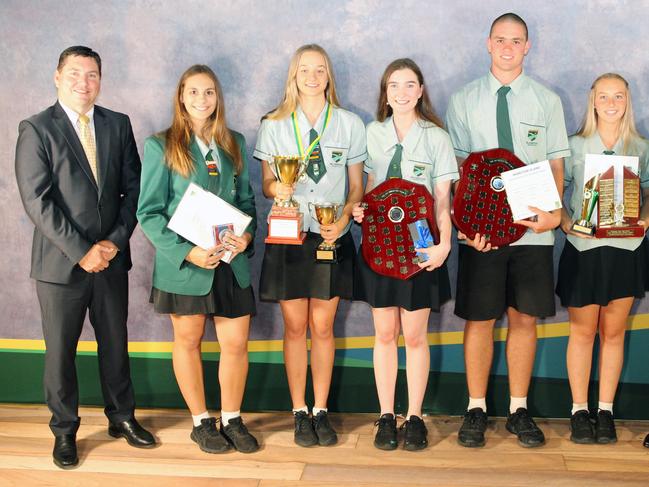 Cannonvale State School principal Don McDermid with award winners Imogen Tulk, Kasey Hogan, Tui Taylor, Jack Dwyer, Emma Faletti, Aiden Payet. Picture: Supplied