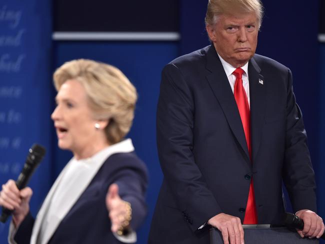 Donald Trump stares down Hillary Clinton during the televised debate. Picture: AFP/Paul J Richards