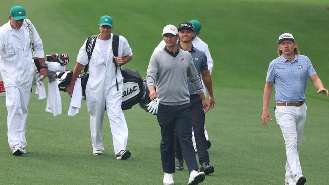 Cameron Smith and Adam Scott on the greens together at Augusta. Picture: Getty Images