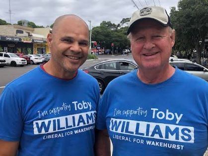 Darrell Williams (left) Manly Sea Eagles great and the father of the Liberal candidate for Wakehurst, Toby Williams, with close family friend Tony Sadgrove, were at Narraweena Public School to greet voters on Saturday. Picture: Jim O'Rourke