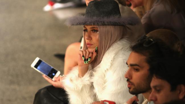 Imogen Anthony watches catwalk action in Auckland.