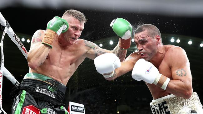 Anthony Mundine (R) lost a controversial decision to long-time rival Danny Green. Picture: Sarah Reed