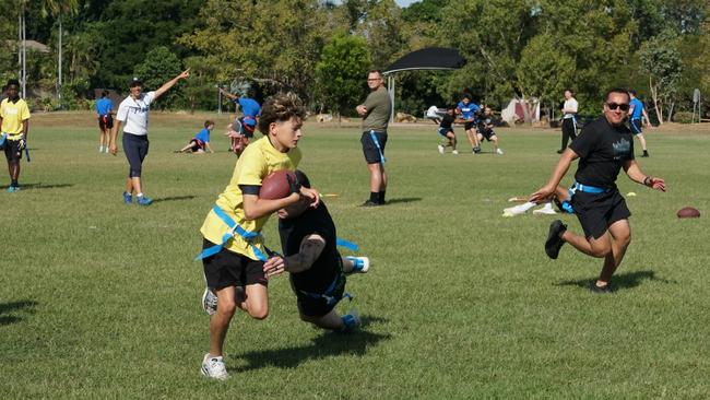 Darwin Middle School students playing Flag Football against United States Marines at DMS, 19 May 2025. Picture: Jason McIntosh