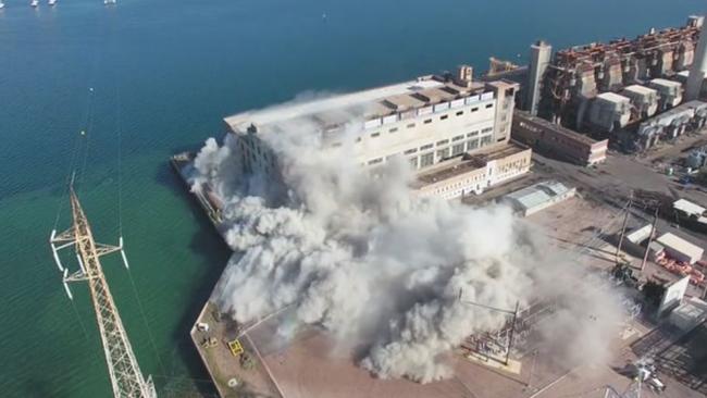 A screengrab of a video showing the Port Augusta Playford A power station stack being demolished last September.