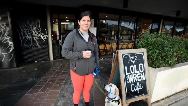 Ashley Dungan with guide dog puppy Ocean at Lolo and Wren. Picture: Andrew Henshaw