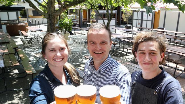 Notting Hill Hotel manager Kris Chapman with bar staff Simon Cook and Jarryd Raffa celebrate after winning best outdoor experience. Picture: George Salpigtidis