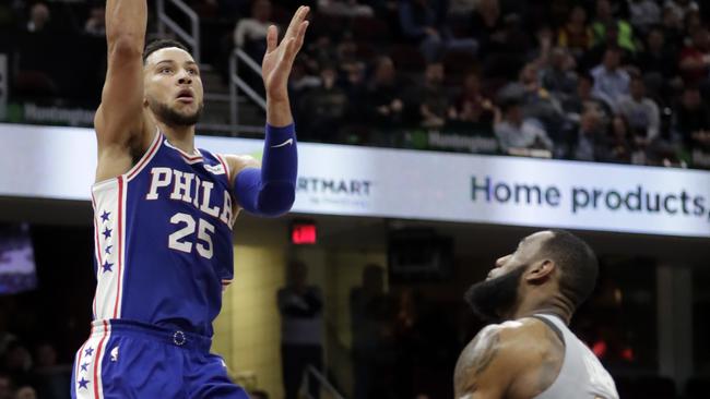 Philadelphia 76ers’ Ben Simmons shoots over Cleveland Cavaliers’ LeBron James. Picture: AP