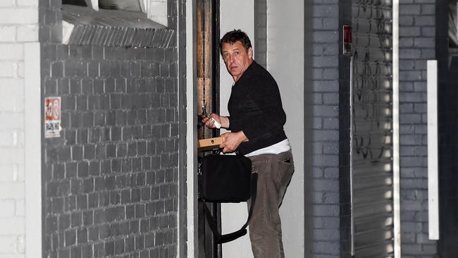 Mark Thompson arriving back at his home in Port Melbourne on Saturday. Picture: Lawrence Pinder