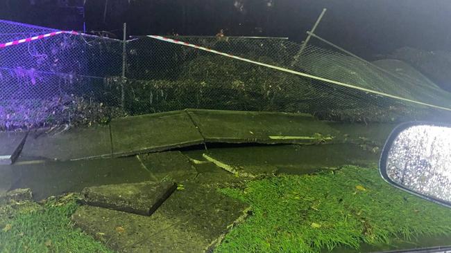 Damage to the fence around Warringah Golf Course, and the footpath, caused by flash flooding from Brookvale Creek and overflowing stormwater drains on Kentwell Rd, North Manly. Picture: SES Manly Unit