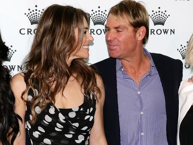 Happier times ... Shane Warne with English actor and model Elizabeth Hurley. Picture: Tauber Andrew