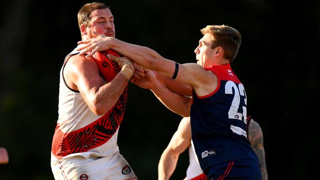 Tarwan Rennie tries to bring down Tom Goodwin. Picture: Josh Chadwick