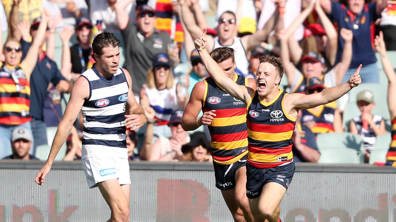 James Rowe celebrates his first AFL goal. Picture: Sarah Reed/AFL Photos via Getty Images