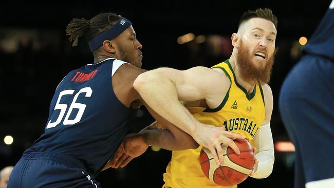 International Basketball Series Australian Boomers V USA Basketball at Marvel Stadium, Saturday August 24, 2019. Myles Turner of Team USA in action against Aron Baynes of the Boomers. Picture: Mark Stewart