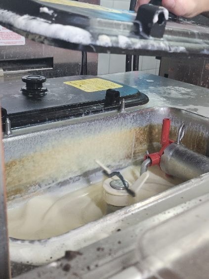 The sundae machine has layers of milk that have become discoloured due to not being cleaned properly. Picture: Supplied