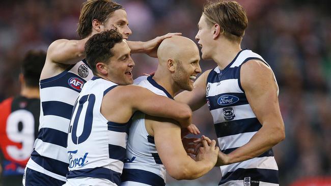 Gary Ablett is mobbed by teammates after kicking a last-quarter goal. Picture: Michael Klein