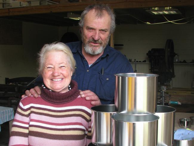 Denise Darnell and Paul Kenyon with some of their cake tins. For Elaine Reeves column for Hobart Mercury Taste page