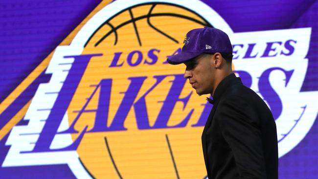 Lonzo Ball walks on stage after being drafted second overall by the Lakers.
