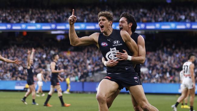 Charlie Curnow celebrates a goal against Collingwood.