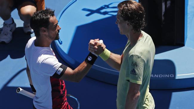 Tomas Berdych, right, is congratulated by Italy's Fabio Fognini. Picture: AP