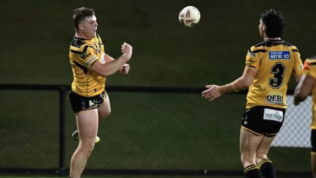 Sunshine Coast Falcons player Jack Gibbons celebrates.