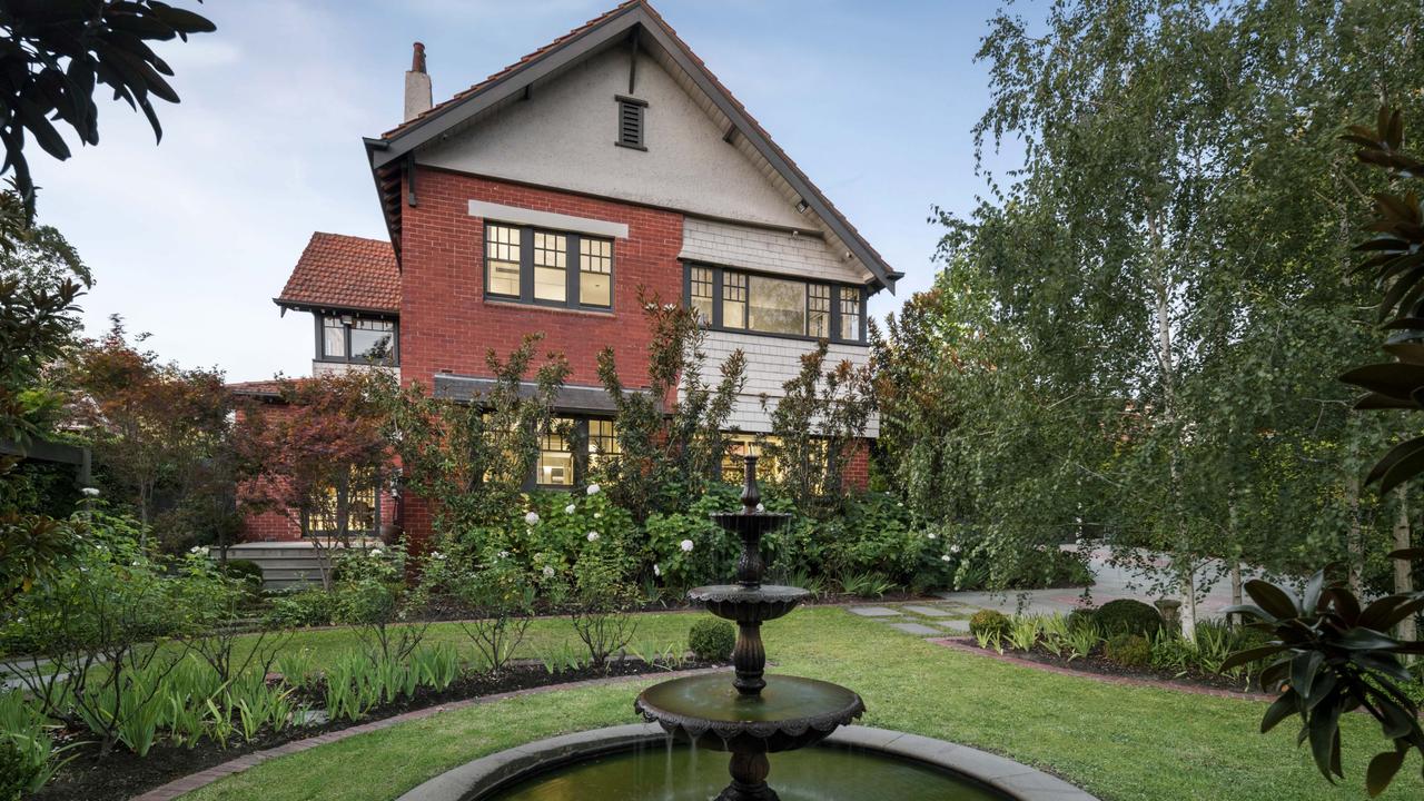 A fountain and fish pond feature in the garden.