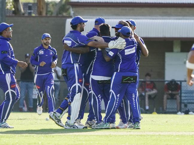 Parkmore players celebrate a wicket late in the match. Picture: Valeriu Campan