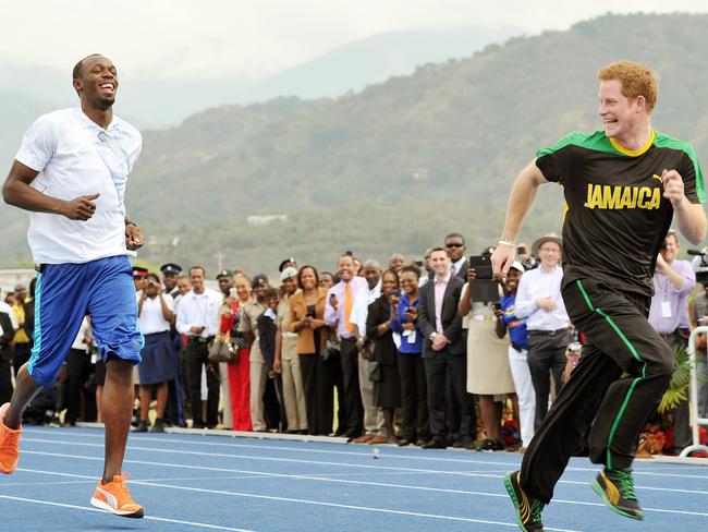 The king of the track and the prince ham it up in 2012.