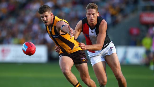 Luke Breust under pressure from Saint Sam Gilbert. Picture: Getty